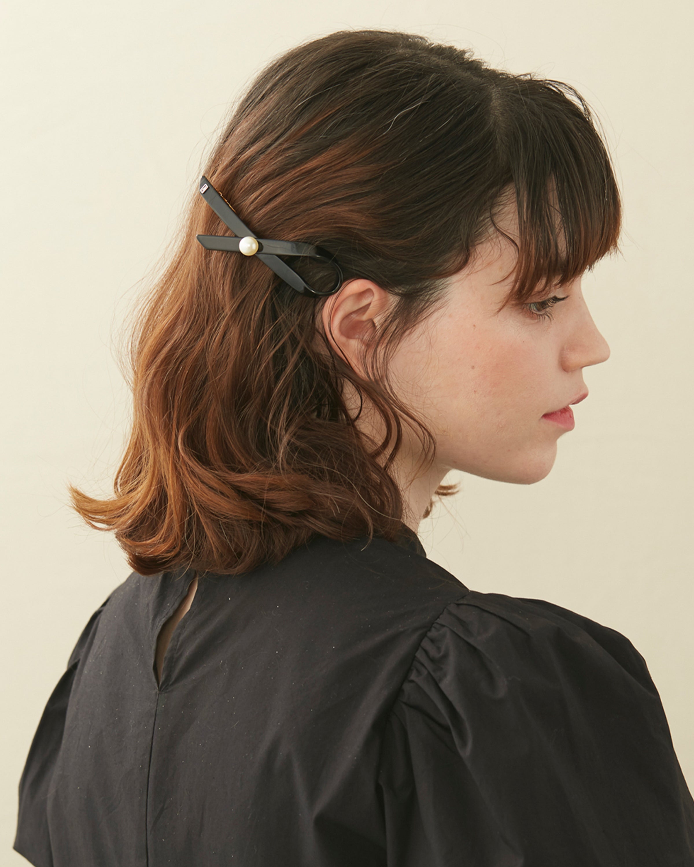 Lutece acetate and pearl barette