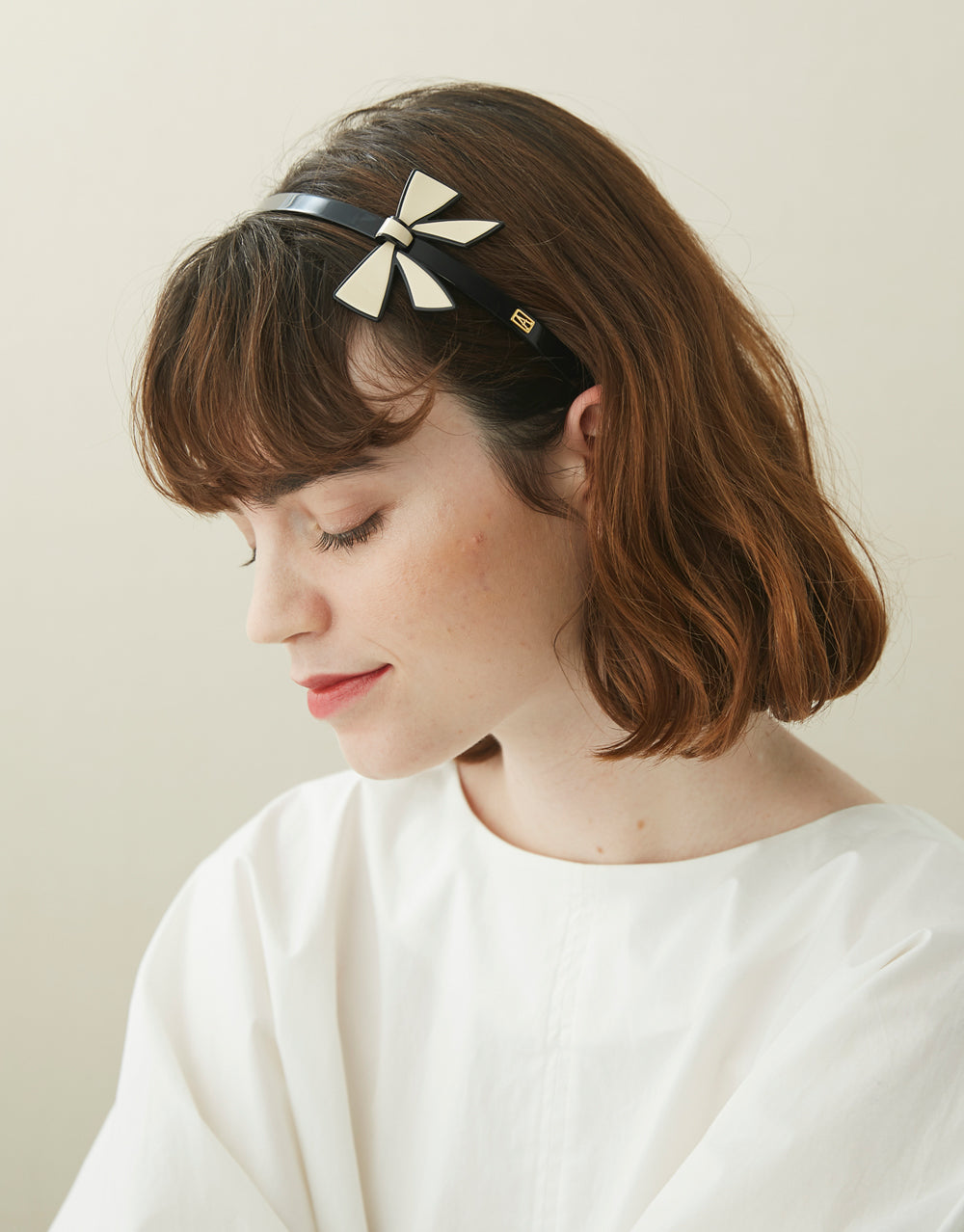 Affinite bow acetate headband